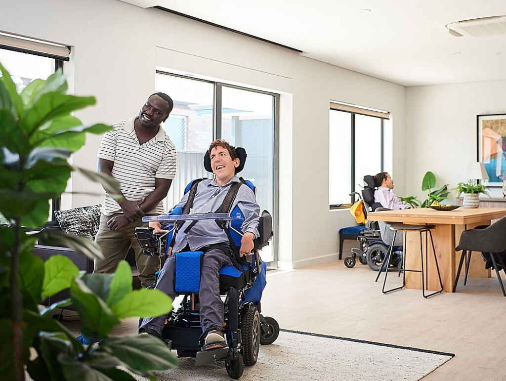 Man enjoying Specialist Disability Accommodation (SDA).